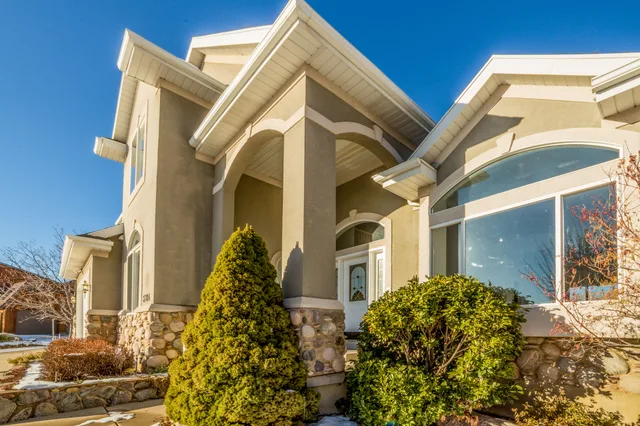 Bright and elegant exterior view of a modern suburban house with landscaped front yard. Marketing a Property Listing as a Team: Four Stages From Control to Review